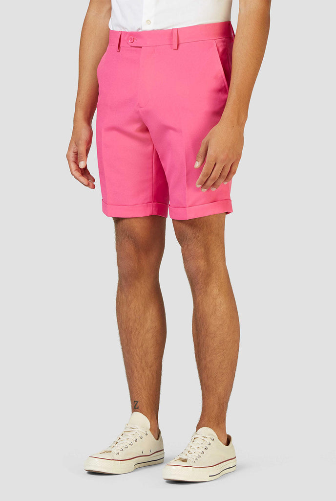 Mann, der rosa Sommeranzug trägt, Nahaufnahme der Hosen