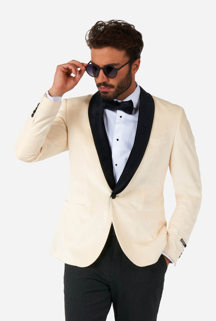 Man wearing ivory white velvet dinner jacket