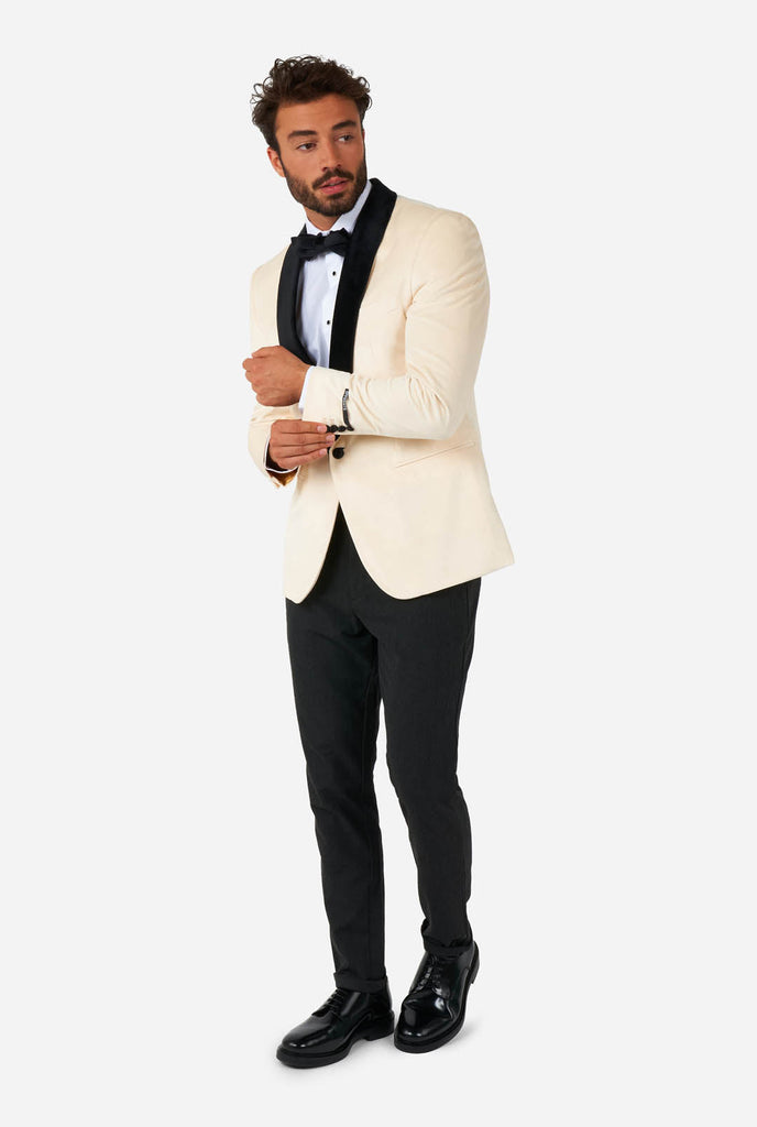 Man wearing ivory white velvet dinner jacket