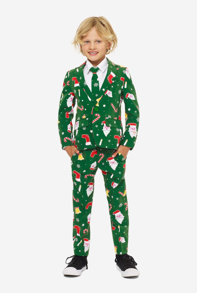 Grüner Weihnachtsanzug für Jungen mit Weihnachts -Cartoon -Ikonen von Jungen getragen