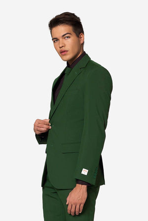 Profilansicht eines Mannes, der einen glorreichen grünen Blazer von OppoSuits mit sichtbarem OPPO-Etikett zuknöpft – ein auffälliger und stylischer grüner Anzug für Männer.