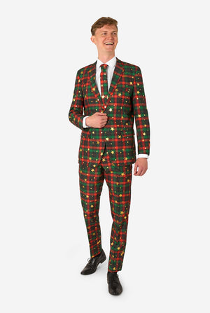 Lachender Mann im Tartan-Weihnachtsanzug mit Sternenmuster.