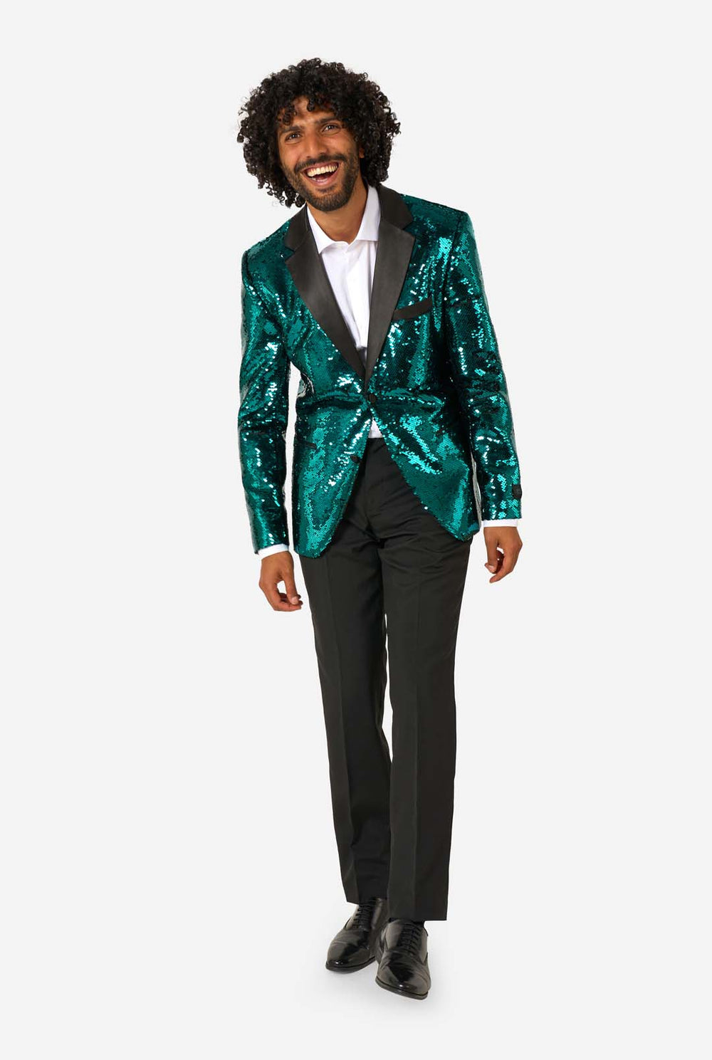 Ein Mann trägt einen türkis-glitzernden Blazer mit schwarzem Satin-Kragen.