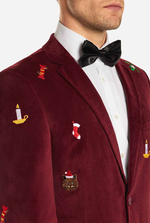Mann, der burgunderrote rote Samt Weihnachtsblazer mit Weihnachtsikonen trägt