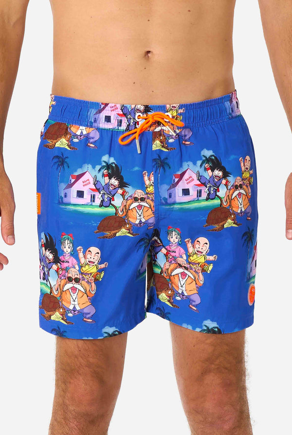 Blaue Badeshorts für Herren mit Dragon Ball-Motiv mit Goku, Krillin, Master Roshi und anderen Charakteren von Kame House. Perfekt für Anime-Fans am Strand oder Pool.