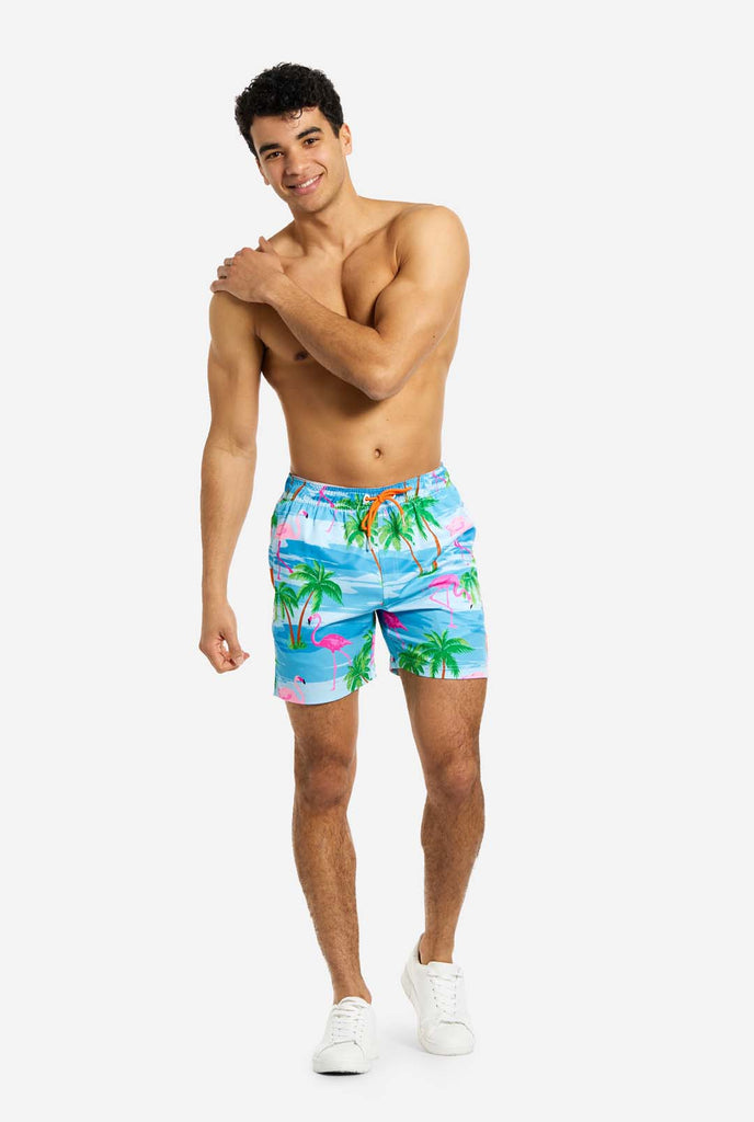 Man wearing Flaminguy swim trunks for men