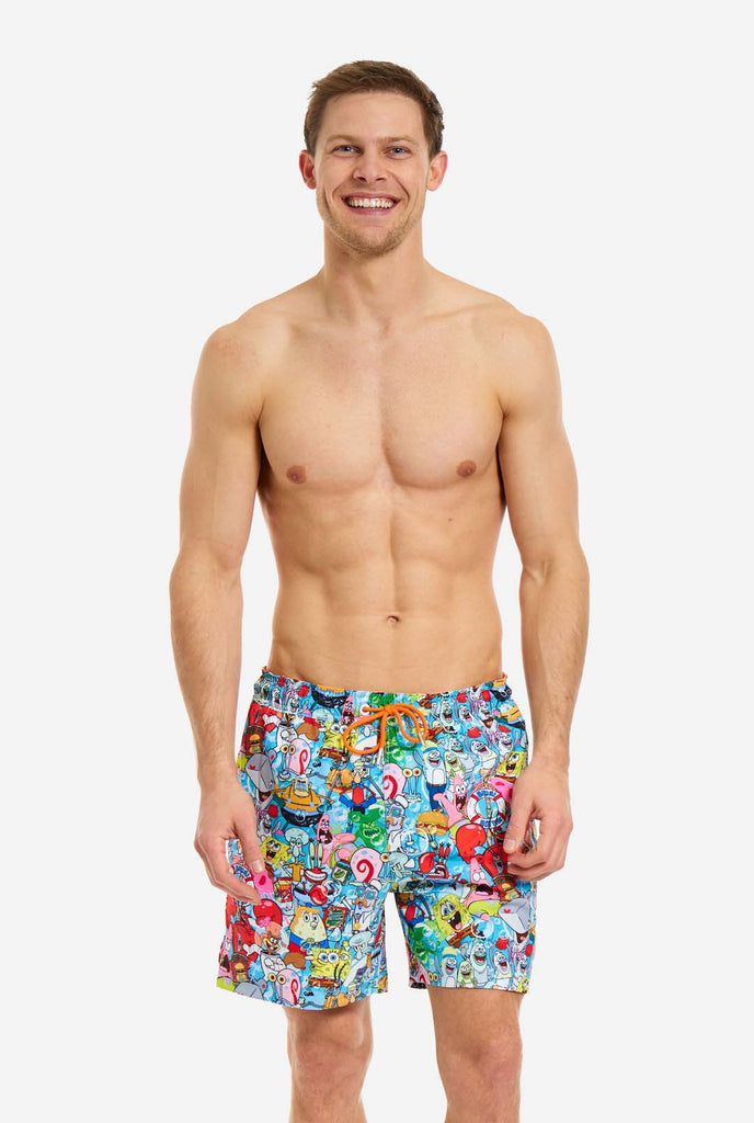 Man wearing swim trunks with SpongeBob print