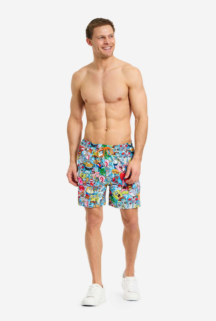 Man wearing swim trunks with SpongeBob print