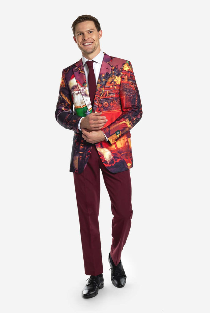 Man wearing burgundy red Christmas suit with vintage Christmas print