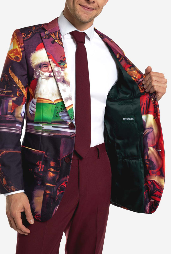 Man wearing burgundy red Christmas suit with vintage Christmas print