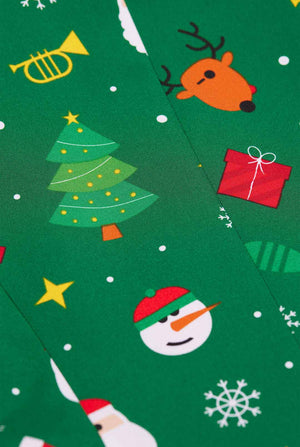 Frau trägt einen grünen Weihnachtsblazer für Damen, der mit Weihnachtsmotiven bedeckt ist.