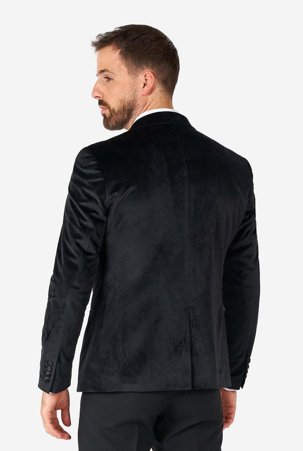 Mann, der schwarze Samt -Dinnerjacke Blazer trägt, Blick von hinten