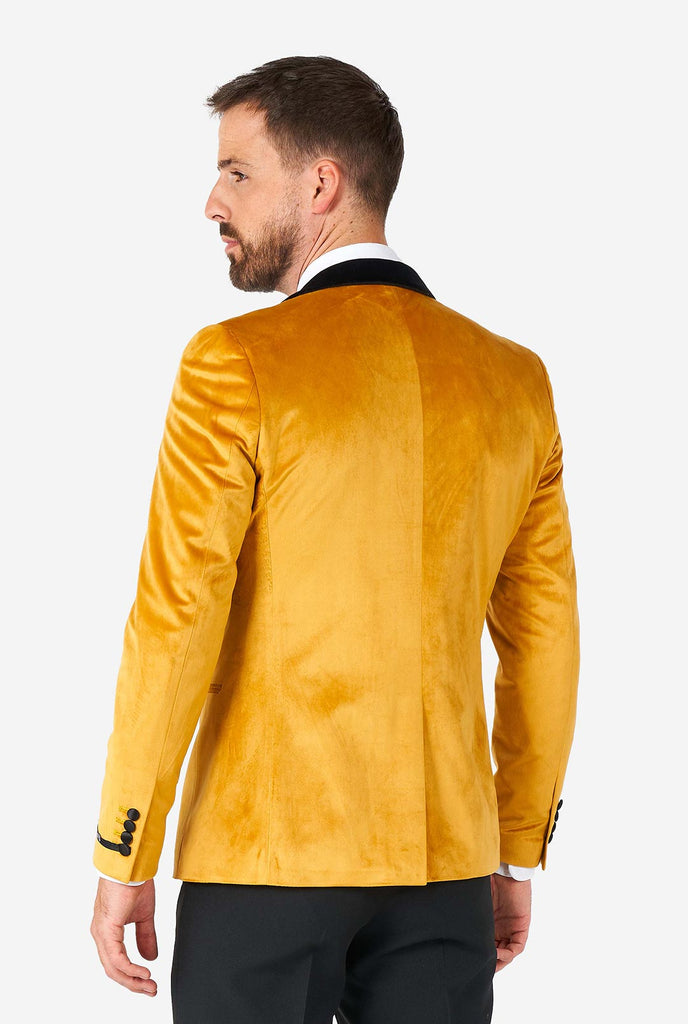 Mann mit goldenem Samt -Dinnerjacke Blazer, Blick von hinten