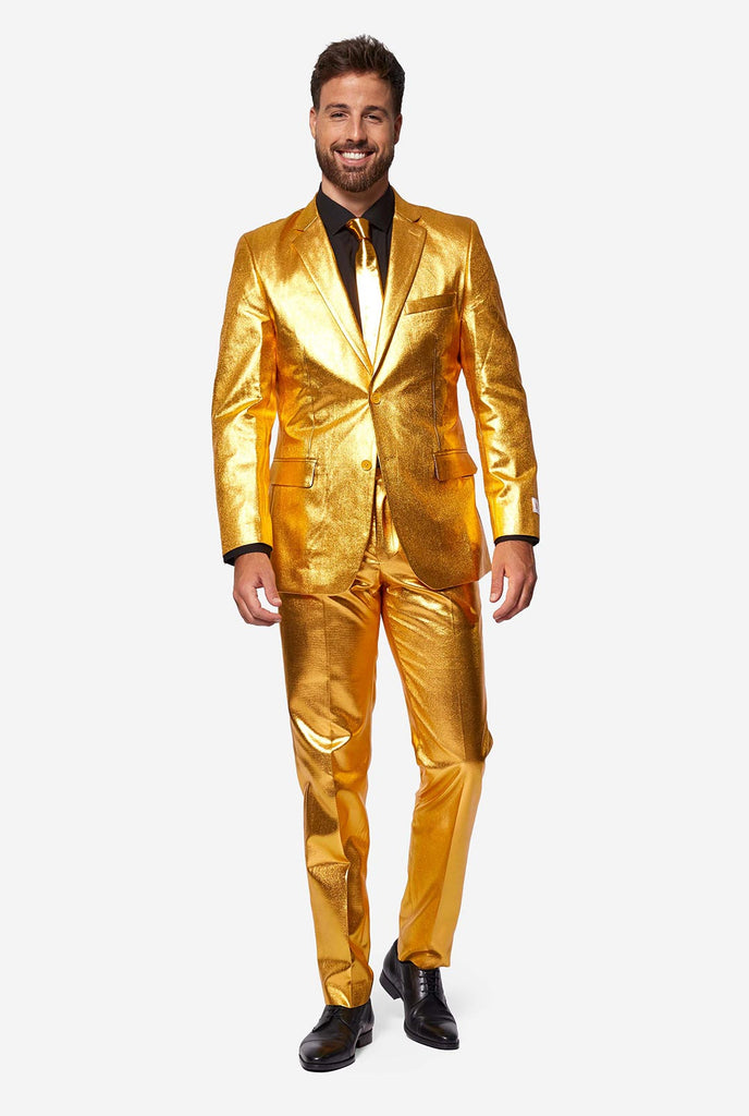Gold -Männer -Partyanzug vom Mann getragen