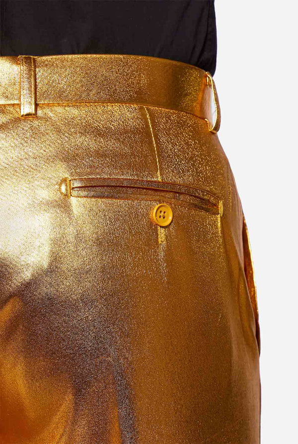 Gold -Männer -Partyanzug vom Mann, Hose in der Nähe