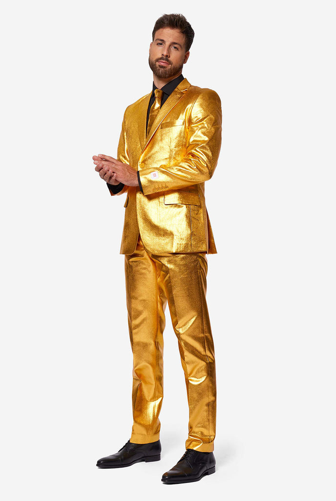 Gold -Männer -Partyanzug vom Mann getragen