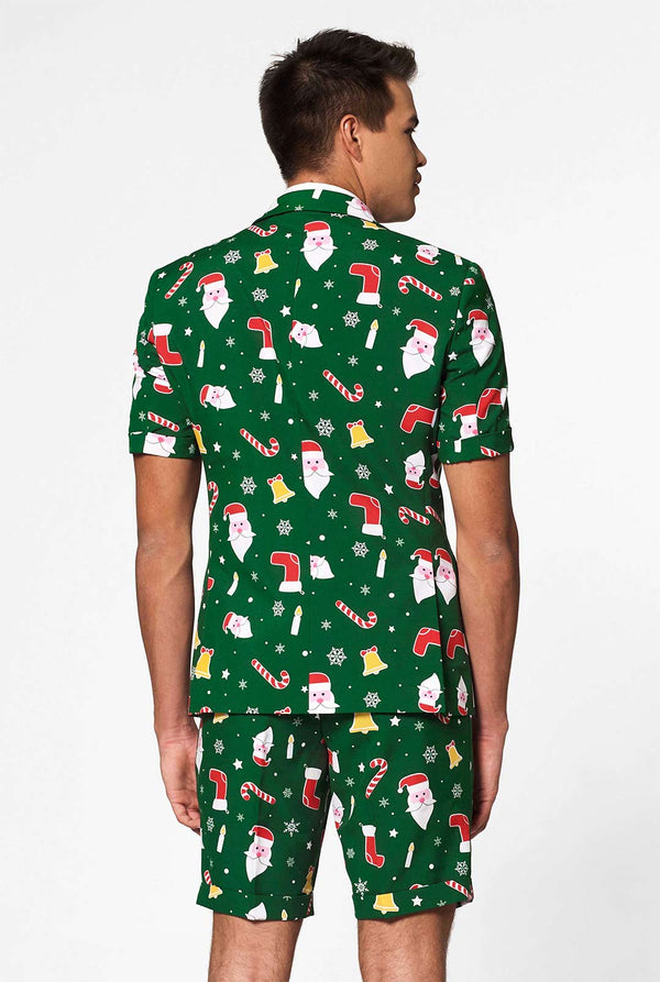 Mann, der grünen Weihnachtssommeranzug trägt, bestehend aus Shorts, Jacke und Krawatte, Blick von hinten