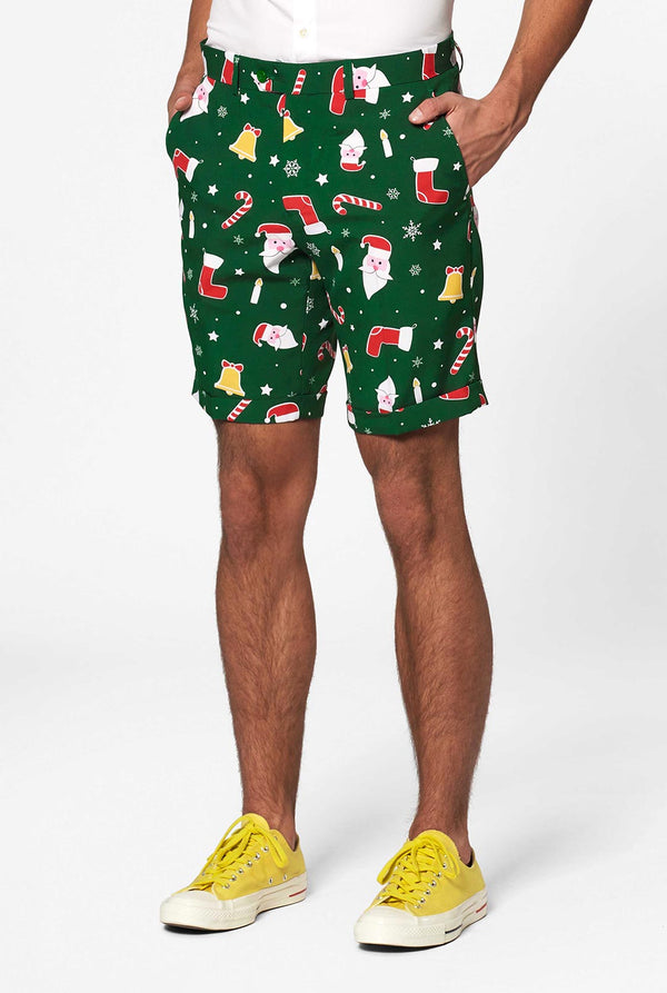 Mann, der einen grünen Weihnachts -Sommeranzug trägt, bestehend aus Shorts, Jacke und Krawatte, Nahaufnahme der Hosen