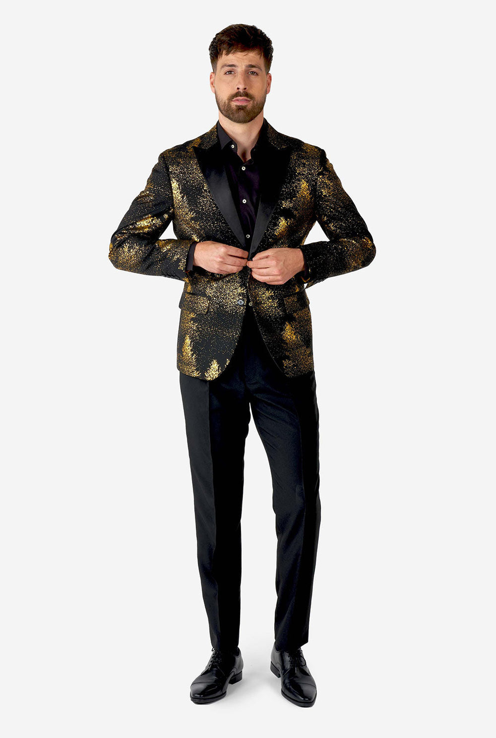 Mann trägt einen schwarzen Blazer mit goldenem Weihnachtsbaumdruck
