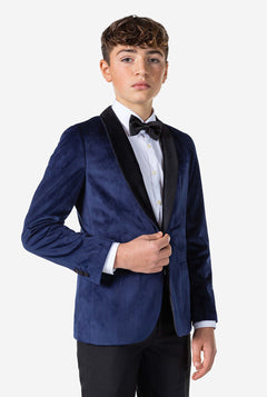 Teenager, der Blaue Samt Weihnacht Jacke trägt