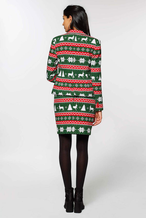 Frau, die einen grünen und roten Weihnachtsanzug trägt, Blick von hinten