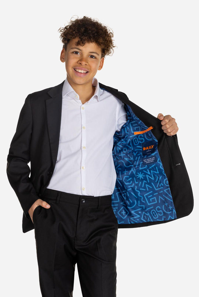 Teen wearing OppoSuits Daily Black teen boys suit